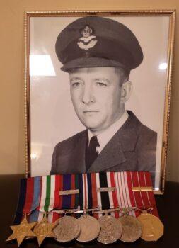 Allen Cameron in his post-war uniform, along with medals from his time in World War II. (Courtesy Jason Antonio)