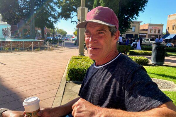 Doug Barnett sits on a bench in Orange, Calif., on Oct. 29, 2020. (Jack Bradley/The Epoch Times)