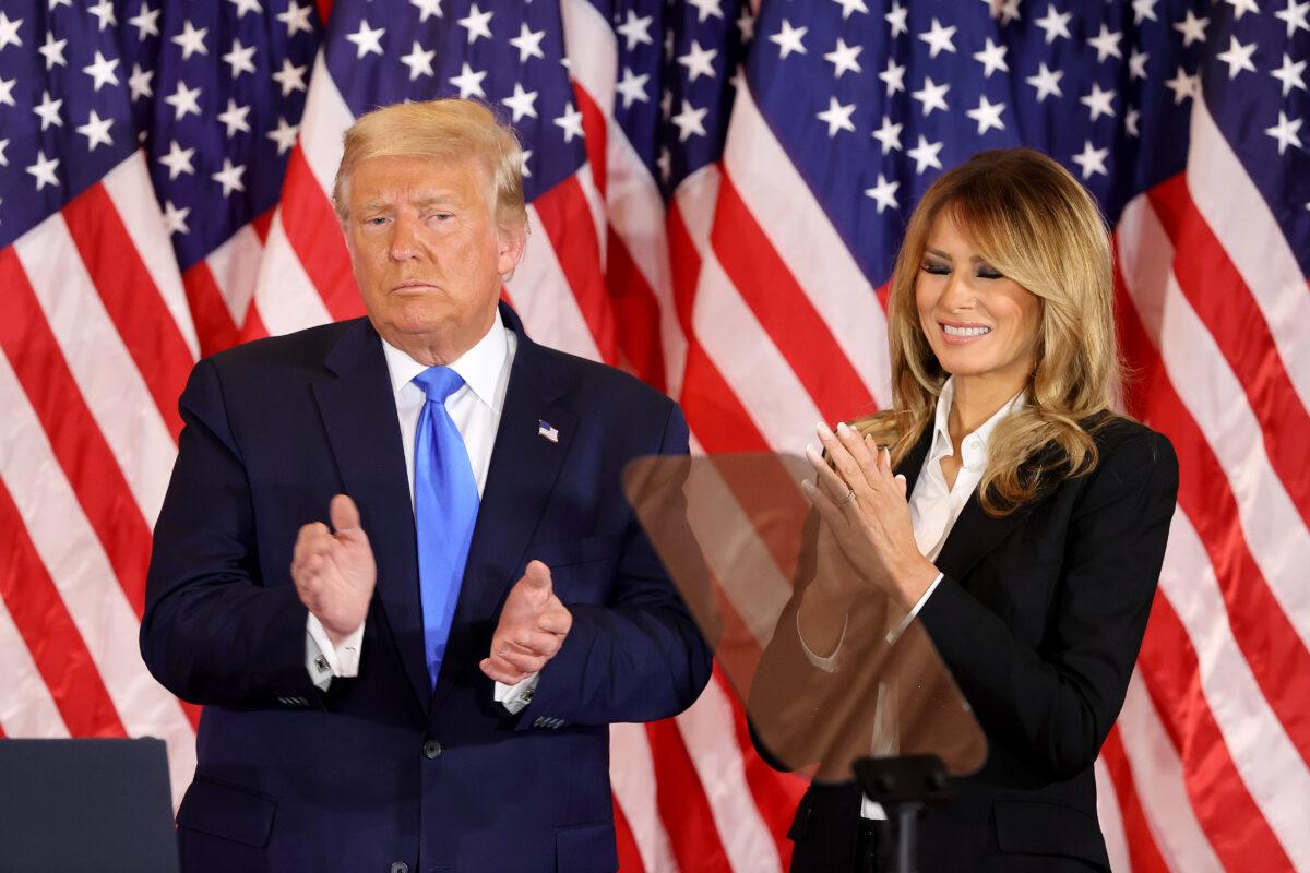  President Donald Trump and First Lady Melania Trump take the stage on election night in the East Room of the White House in Washington early Nov. 4, 2020. (Chip Somodevilla/Getty Images)