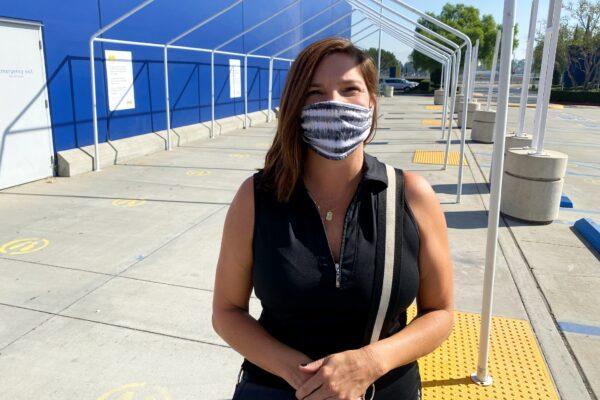 Melissa Morris stands in Costa Mesa, Calif., on Oct. 29, 2020. (Jack Bradley/The Epoch Times)