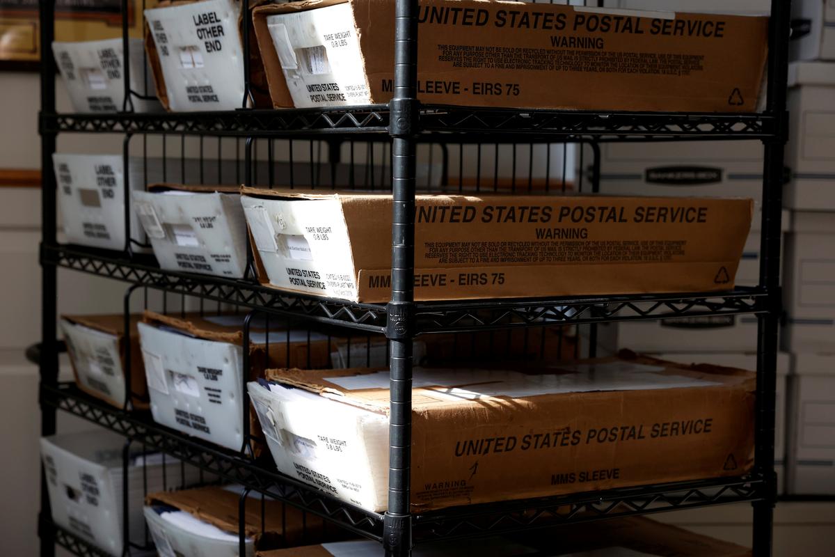 Boxes with mail-in ballots wait to be counted at the Northampton County Courthouse on Election Day in Easton, Penn., on Nov., 3, 2020. (Rachel Wisniewski/Reuters)