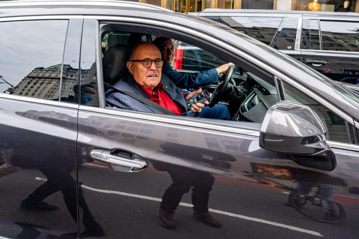 Former New York City Mayor and President Donald Trump's personal attorney Rudy Giuliani drives by a march and rally for President Donald Trump in New York City on Oct. 25, 2020. (David Dee Delgado/Getty Images)