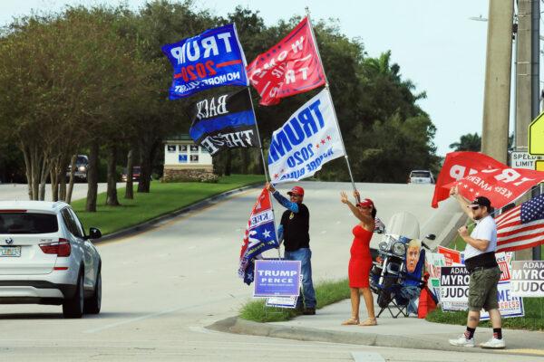 Supporters of President Donald Trump rally in front of the polling location at the Wellington Brand Library in Wellington, Florida, on Nov. 3, 2020. (Bruce Bennett/Getty Images)