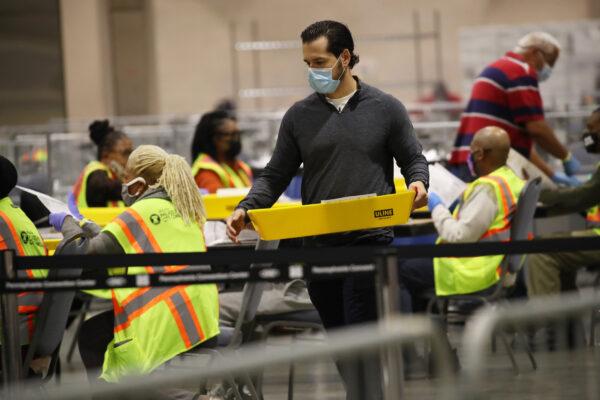 Election workers count ballots in Philadelphia, Penn., on Nov. 4, 2020. (Spencer Platt/Getty Images)