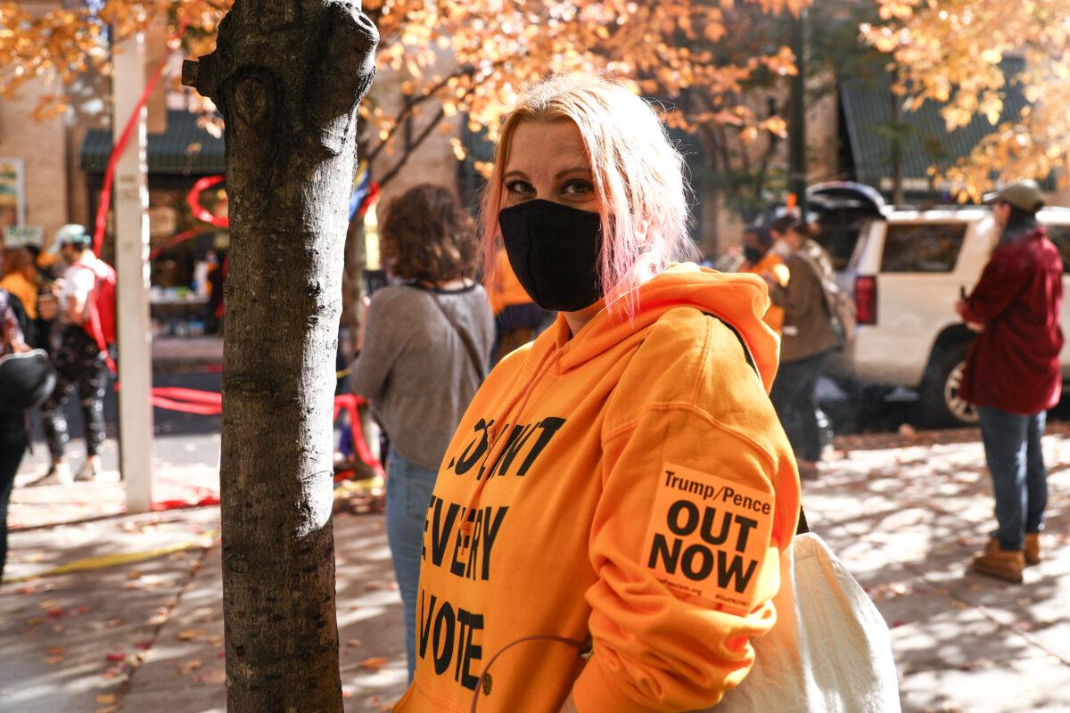 Skylar Harris joins the pro-Biden protest by the Pennsylvania Convention Center in Philadelphia, Pa., on Nov. 6, 2020. (Charlotte Cuthbertson/The Epoch Times)