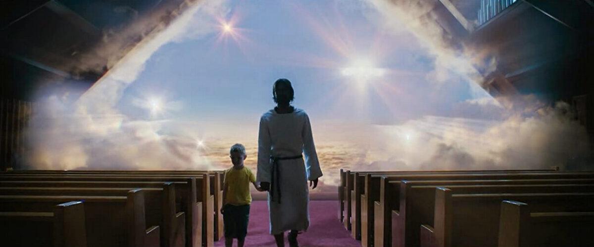 Colton Burpo (Connor Corum, L) walks with Jesus, in “Heaven Is for Real.” (TriStar Pictures)