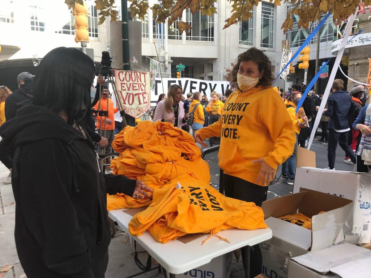 People gather outside the Pennsylvania Convention Center in Philadelphia, Pa., to call for all votes to be counted, on Nov. 6, 2020. (Charlotte Cuthbertson/The Epoch Times)