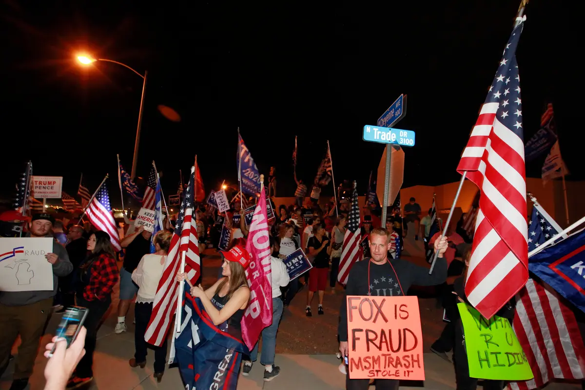 Donald Trump supporters protest the Nevada vote outside Clark County Election Department in North Las Vegas, Nev., on Nov. 5, 2020. (Ronda Churchill/AFP via Getty Images)
