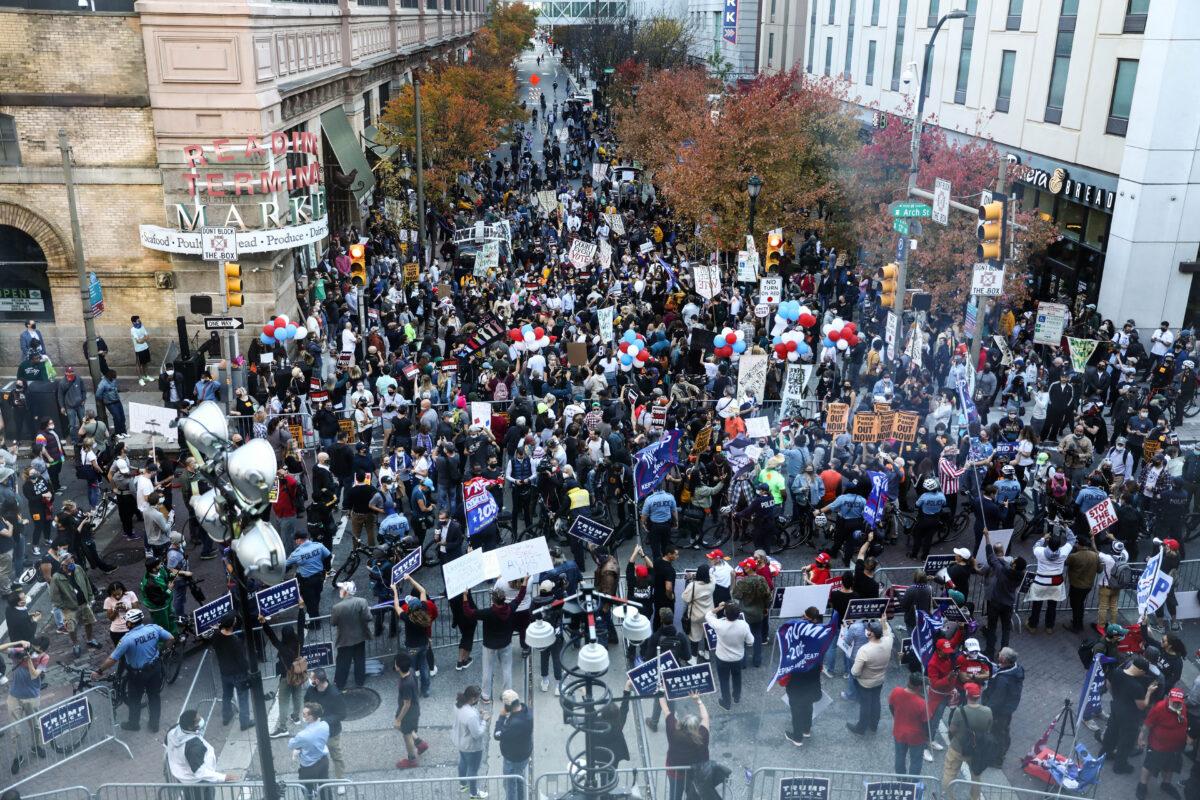 The crowd outside the Pennsylvania Convention Center in Philadelphia, on Nov. 6, 2020. (Charlotte Cuthbertson/The Epoch Times)