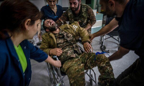 A soldier is taken into a hospital after being wounded at the front-line in the outskirts of Stepanakert, Nagorno-Karabakh, on Nov. 6, 2020. (Ricard Garcia Vilanova/AP Photo)