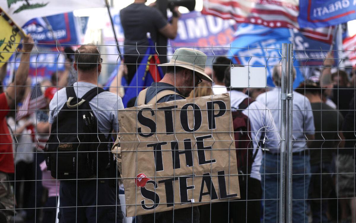 Supporters of President Donald Trump demonstrate at a "Stop the Steal" rally in front of the Maricopa County Elections Department office in Phoenix, Ariz., on Nov. 7, 2020. (Mario Tama/Getty Images)