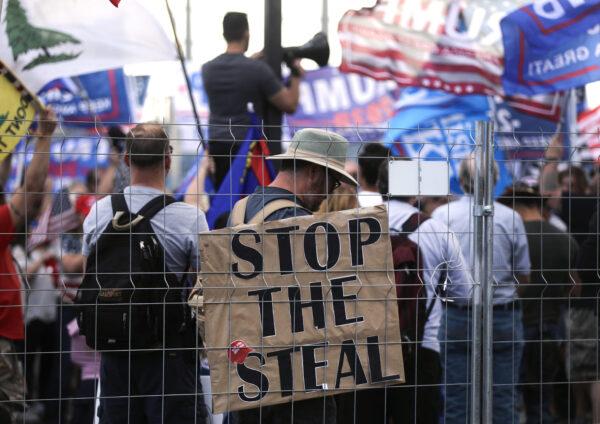 Supporters of President Donald Trump demonstrate at a ‘Stop the Steal’ rally in front of the Maricopa County Elections Department office in Phoenix, Arizona, on Nov. 7, 2020. (Mario Tama/Getty Images)