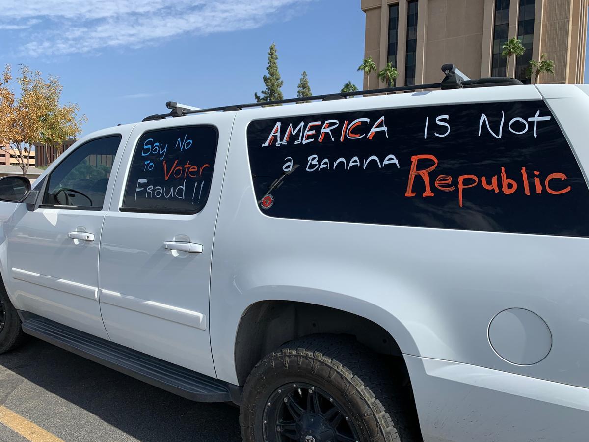 A car is near the "Stop the Steal" rally in front of the State Capitol in Phoenix, Ariz., on Nov. 7, 2020. (The Epoch Times)