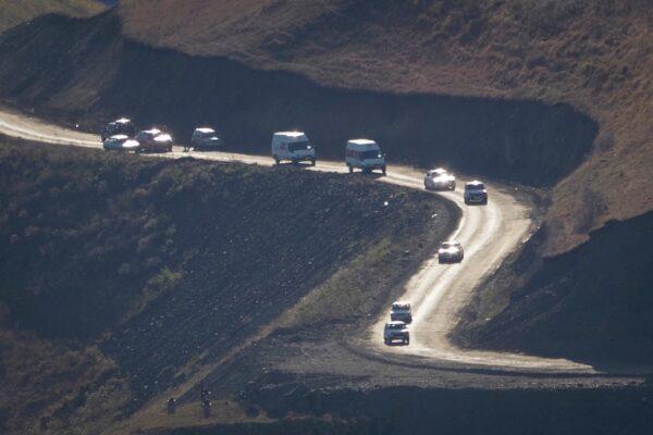 Cars with people leaving the separatist region of Nagorno-Karabakh to Armenia approach the border of Armenia, on Nov. 8, 2020. (AP Photo)