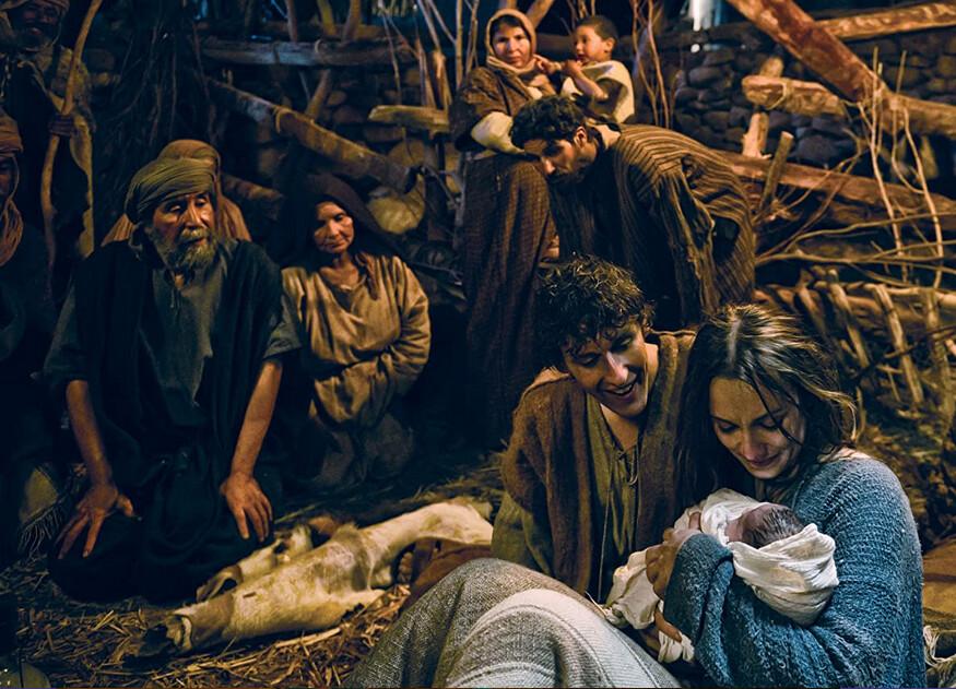 Joseph (Joe Coen) and Mary (Roma Downey, lower right corner) as the parents of Jesus, holding baby Jesus, in "Son of God." (Twentieth Century Fox)