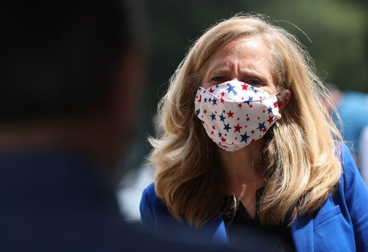 Rep. Abigail Spanberger (D-Va.) waits in line to vote at the Henrico County Registrar’s office in Henrico, Va., on Sept. 18, 2020. (Win McNamee/Getty Images)