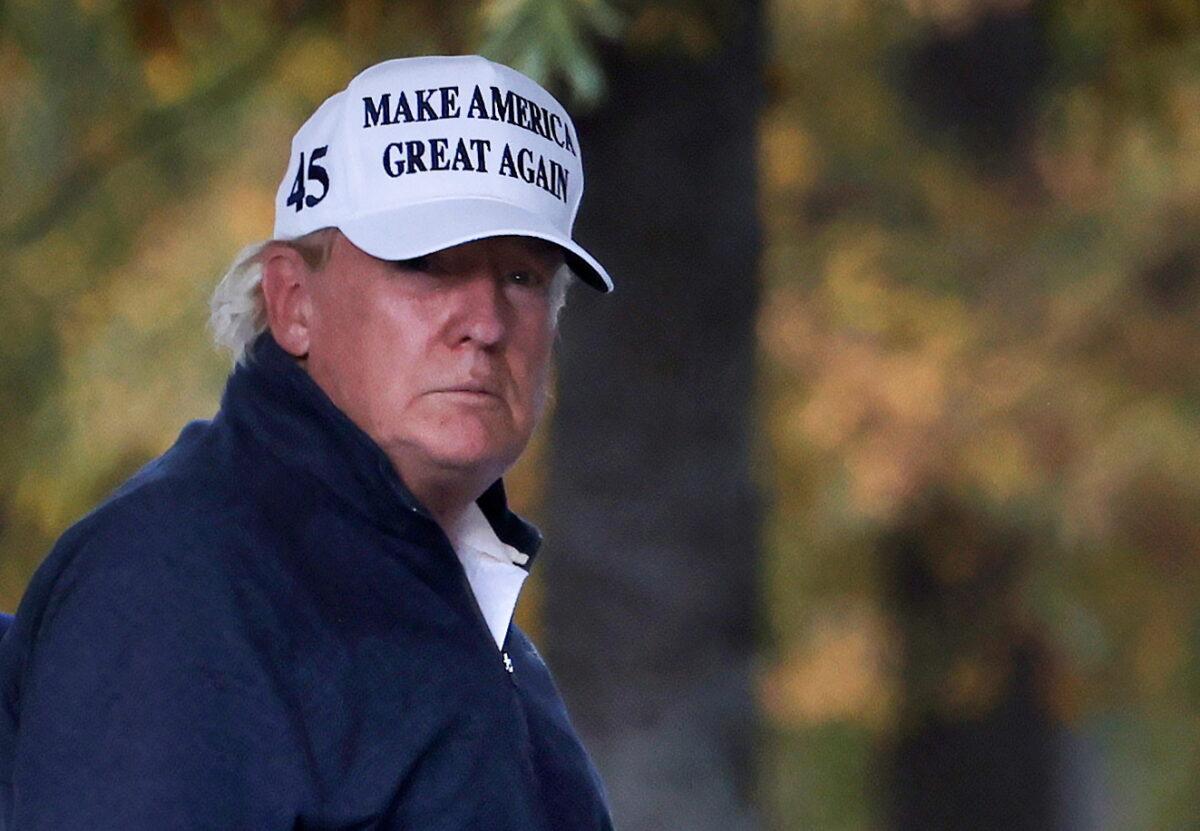 President Donald Trump returns to the White House after playing a round of golf, in Washington on Nov. 7, 2020. (Carlos Barria/Reuters)