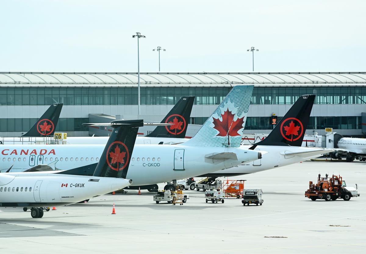 Air Canada Reports $685M Third Quarter Loss Compared With $636M Profit a Year Ago