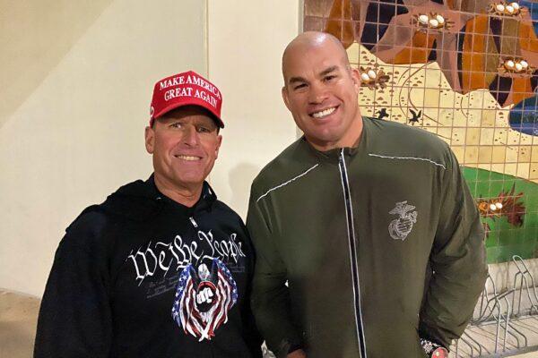 Tito Ortiz (L), a famed mixed martial artist and city council candidate, with his campaign manager, Rick Brown, in Huntington Beach, Calif., on Nov. 2, 2020. (Jack Bradley/The Epoch Times)