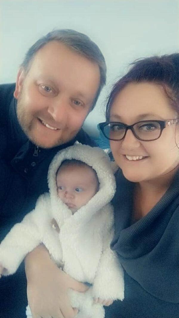  Parents Richard Touhladjiev, 45, and Marie, 34 with their daughter Tahlia. (Caters News)