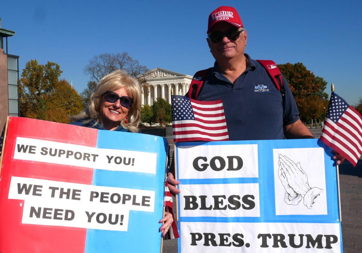 Tracy Welch, a program manager of the Department of Defense, and his wife, Cherrie Welch, at the “Stop the Steal” rally in front of the U.S. Supreme Court in Washington on Nov. 7, 2020. (Sherry Dong/The Epoch Times)