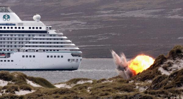 The Joint Service Explosive Ordnance Disposal unit detonate a Spanish made anti-vehicle mine in sight of a cruise ship, in Stanley, Falkland Islands, on Feb. 9, 2007. (Peter Macdiarmid/Getty Images)