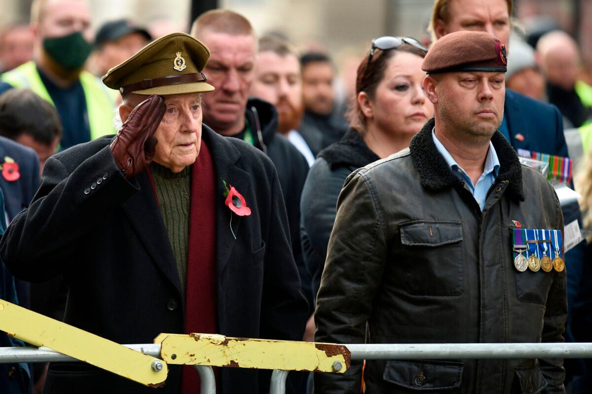 Veterans observe a 2-minute silence for Armistice Day in remembrance of the nation's war dead on Nov. 11, 2020, at the Cenotaph in London. (Daniel Leal-Olivas/AFP)