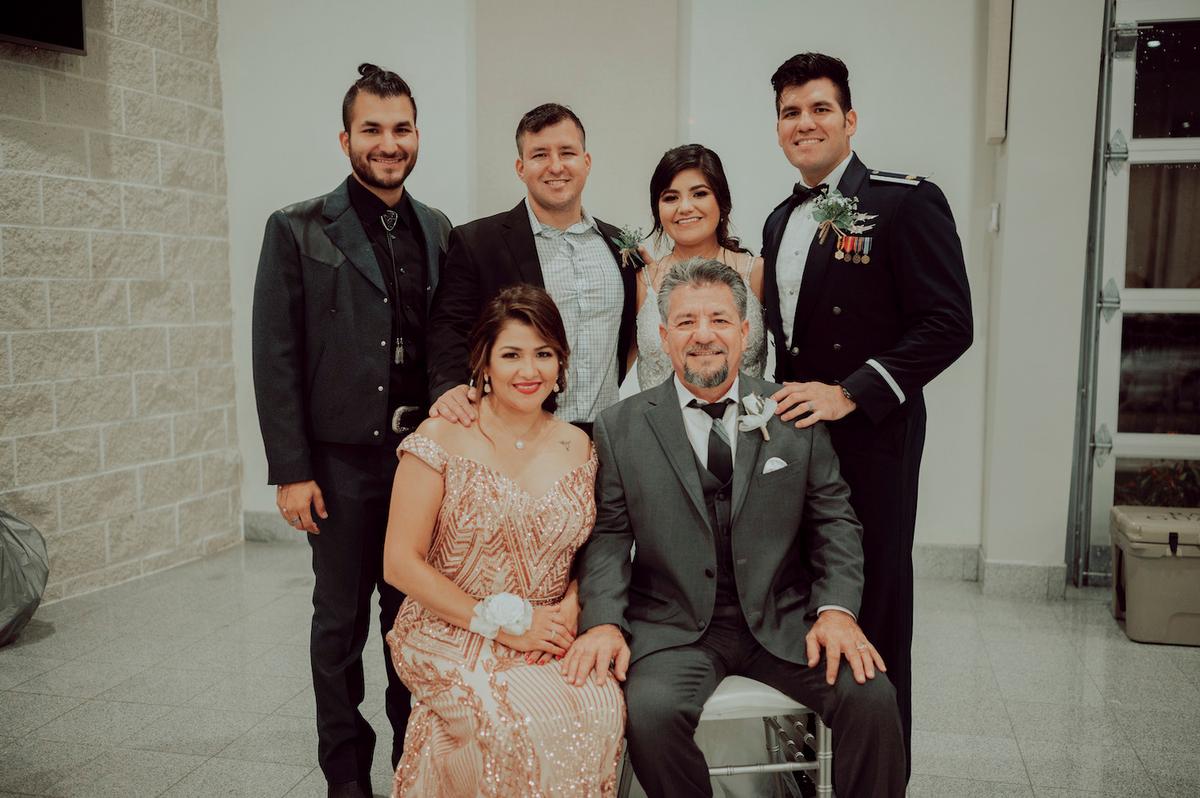 Dalila and Juan Perez with their four children at Joy's wedding in August 2020 (Courtesy of <a href="https://www.facebook.com/perezemptynest/">Dalila Perez</a>)