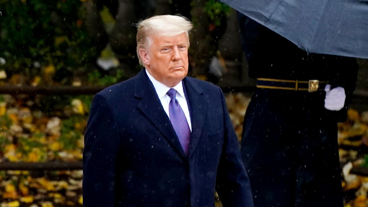 President Donald Trump observes Veterans Day at Arlington National Cemetery in Arlington, Va., on Nov. 11, 2020. (Patrick Semansky/AP Photo)