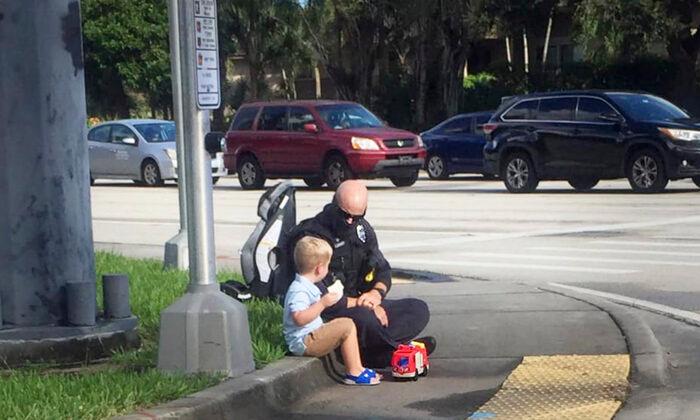 Candid Photo of Cop Comforting Kid After Car Accident Reveals ‘Act of Kindness’