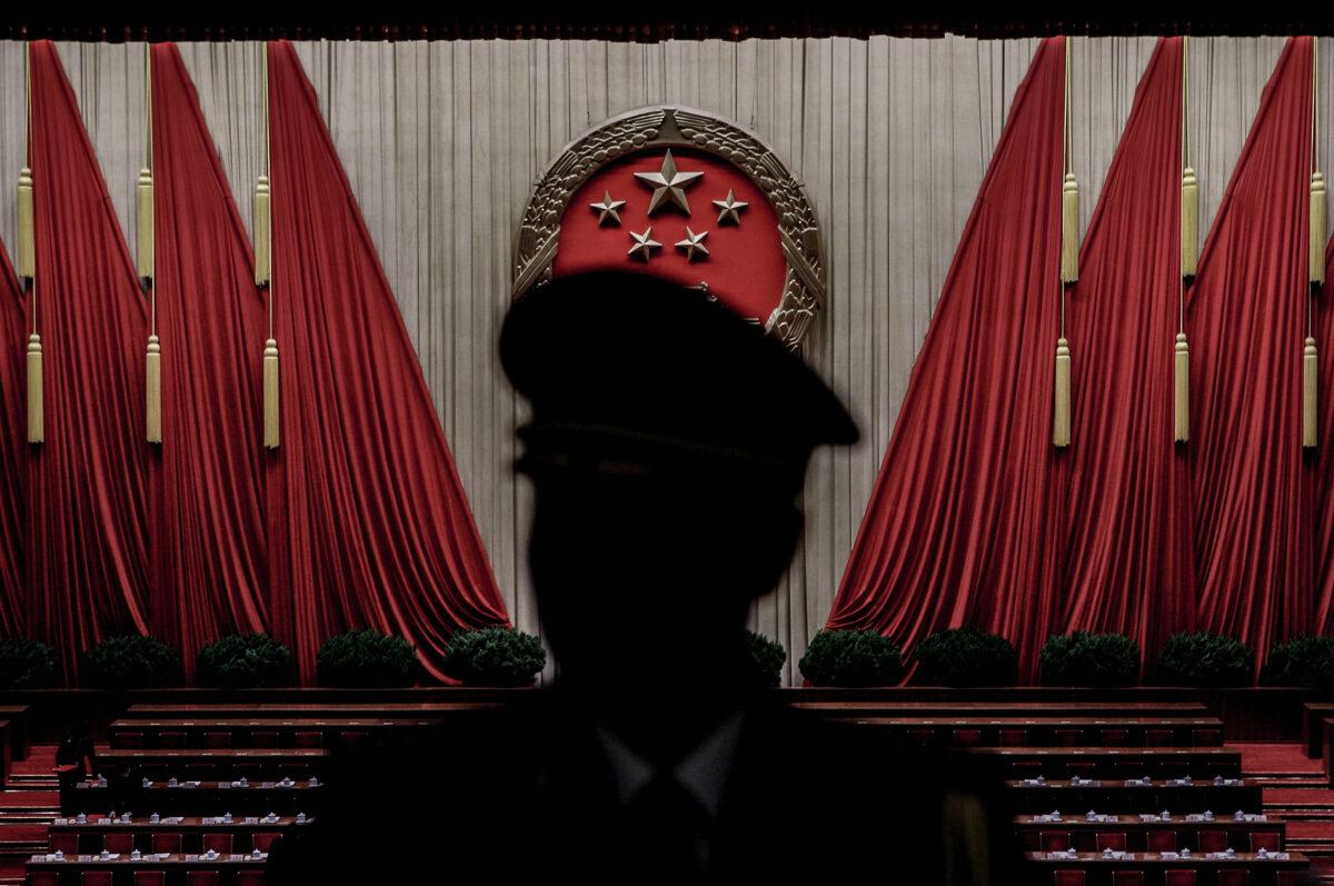 A Chinese military band conductor is seen during a rehearsal before the closing session of the rubber-stamp's legislature's conference at the Great Hall of the People in Beijing, China on March 13, 2009. (Guang Niu/Getty Images)