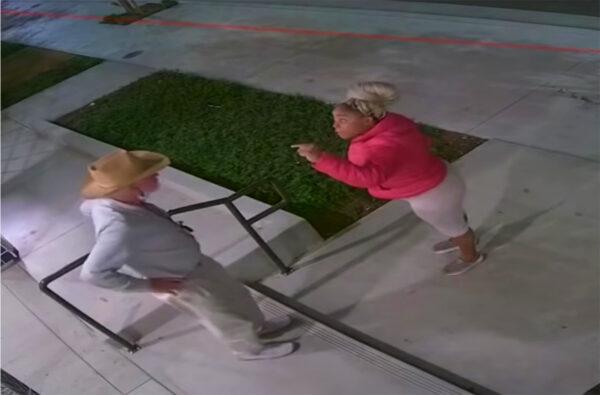 A screenshot from surveillance video shows a woman pointing at a man before allegedly assaulting him in Santa Ana, Calif., on Oct. 21, 2020. (Courtesy of the Santa Ana Police Department)