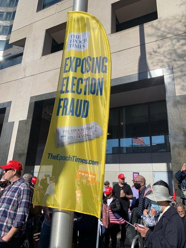 A banner from The Epoch Times is seen at the rally in Washington. (Courtesy of Teresa You)
