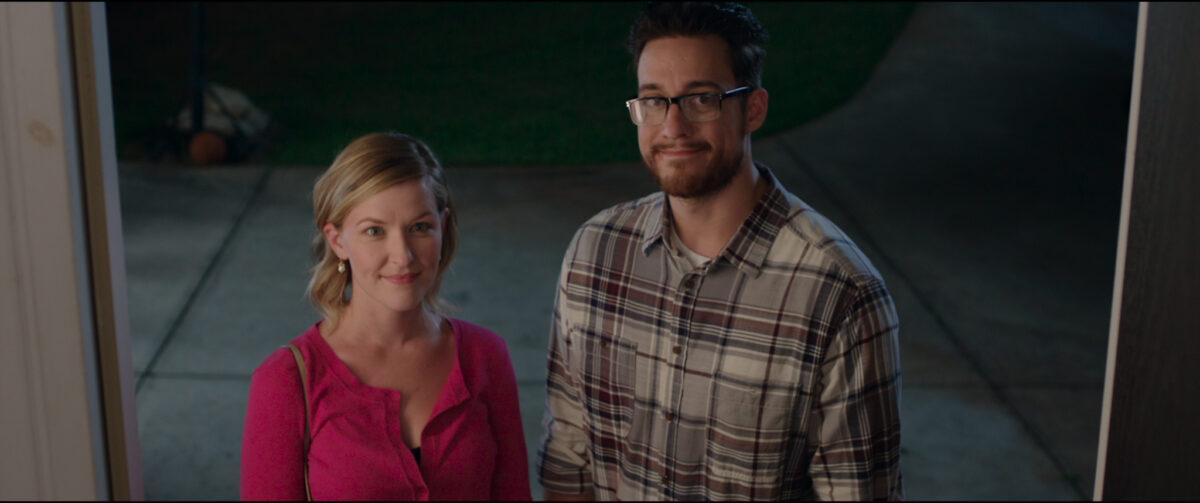 Mary Cooper (Emily Dunlop) and husband R. Scott Cooper (Sterling Hurst) arrive for the small group church meeting, in “Small Group the Movie.” (Gathr Films/Ocean Avenue Entertainment)