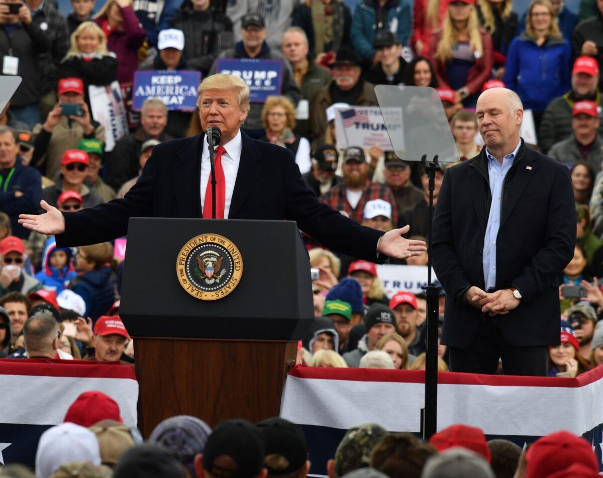 Rep. Greg Gianforte (R-Mont.) looks on as President Donald Trump speaks, in Belgrade, Mont., on Nov. 3, 2018. (Nicholas Kamm/AFP via Getty Images)