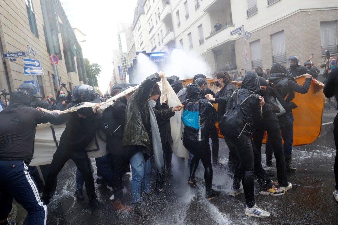 Water Cannon Fired at Frankfurt Anti-Lockdown Rally