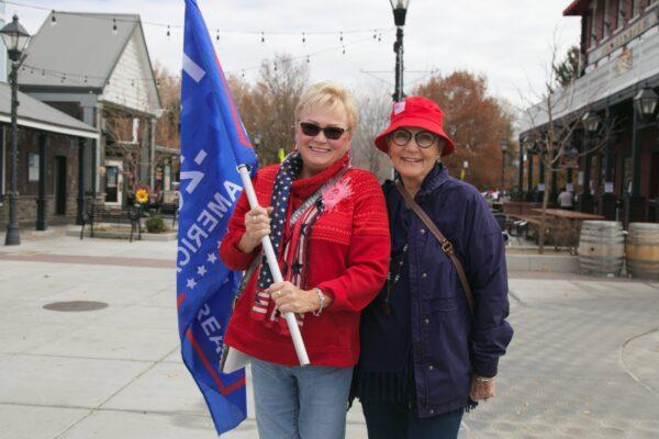 Attendees Beverly Colline (L) and Victoria Galbraith (R) at the “Stop the Steal” rally near the Nevada State Capitol in Carson City, Nev., on Nov. 14, 2020. (Mark Cao/NTD)