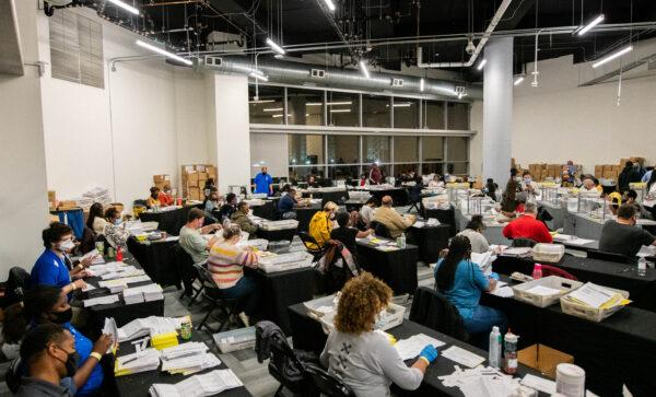 Employees of the Fulton County Board of Registration and Elections process ballots in Atlanta, Ga., on Nov. 4, 2020. (Brandon Bell/Reuters)