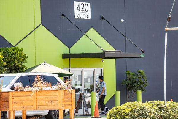 A man enters 420 Central cannabis shop in Santa Ana, Calif., on Aug. 14, 2020. (John Fredricks/The Epoch Times)