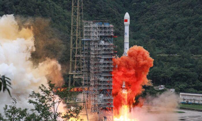 A Long March 3B rocket  lifts off from the Xichang Satellite Launch Center in Xichang, China, on June 23, 2020. (STR/AFP via Getty Images)