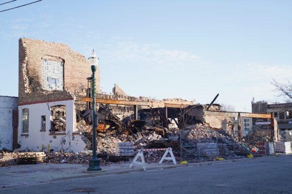 Across the street from Diego Salaris's store is a now-destroyed commercial building that once housed the Danish Brotherhood Lodge and a mattress store in Kenosha, Wis., on Nov 12, 2020. (Cara Ding/The Epoch Times)