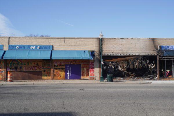 Businesses, including the Uptown Restaurant, remain boarded up from damage incurred by August rioting in Kenosha, Wis., on Nov. 12, 2020. (Cara Ding/The Epoch Times)
