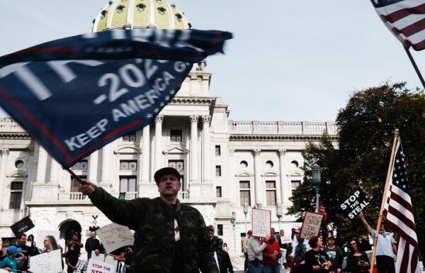 Dozens of people calling for stopping the vote count in Pennsylvania because of alleged fraud against President Donald Trump gather on the steps of the State Capital in Harrisburg, Pa., on Nov. 5, 2020. (Spencer Platt/Getty Images)