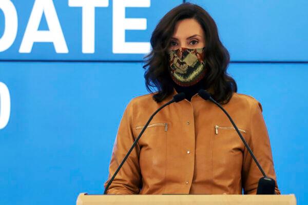 Michigan Gov. Gretchen Whitmer announces new restrictions amid the COVID-19 pandemic in Lansing, Mich., on Nov. 15, 2020. (Michigan Office of the Governor via AP)