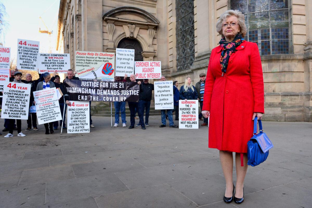 Julie Hambleton, whose sister Maxine was killed in the Birmingham Bombing, poses in St. Philip's Cathedral Square before the first day of the inquest into the Birmingham Bombings on Feb. 25, 2019, in Birmingham, UK. (Anthony Devlin/Getty Images)