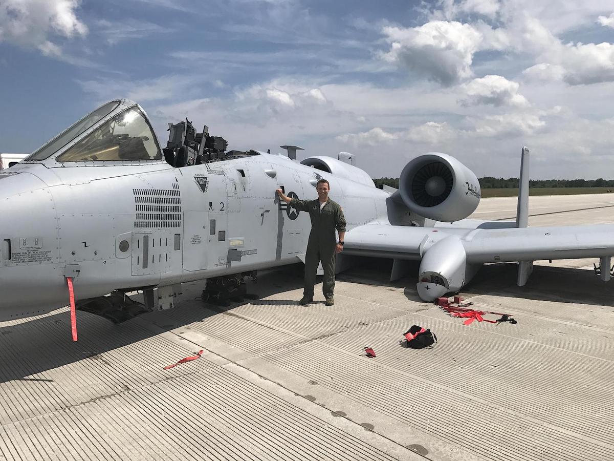 Then-Capt. Brett DeVries beside the aircraft he landed safely after a serious malfunction at Michigan's Alpena Combat Readiness Training Center on July 20, 2017. (<a href="https://www.dvidshub.net/image/4066265/no-second-guesses-selfridge-pilots-share-story-emergency-landing">Terry Atwell</a>/127th Wing Public Affairs)