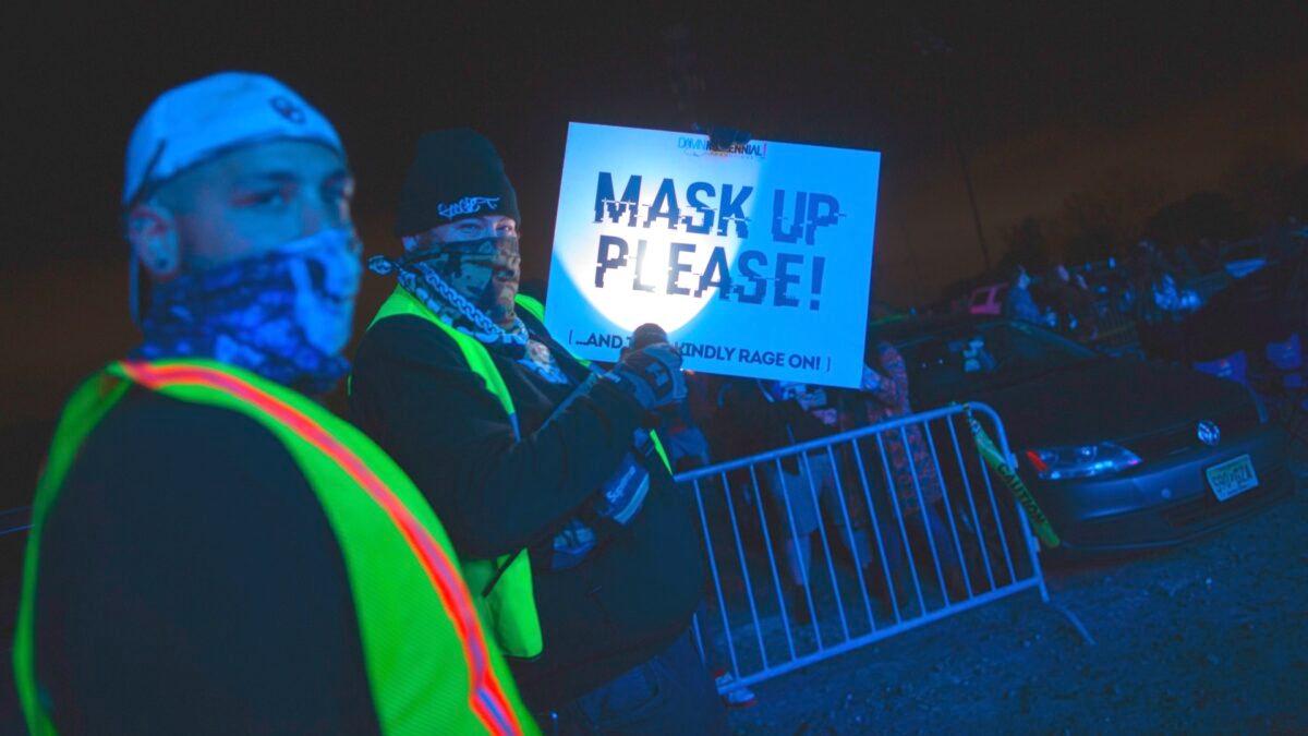 Workers display a sign during the Montage Mountain rave in Scranton, Pennsylvania, on Oct. 23, 2020. (Kena Betancur/AFP via Getty Images)