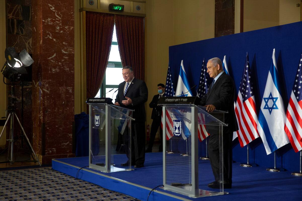 Secretary of State Mike Pompeo (L) and Israeli Prime Minister Benjamin Netanyahu make a joint statement after a meeting in Jerusalem, on Nov. 19, 2020. (Maya Alleruzzo/Pool via Reuters)