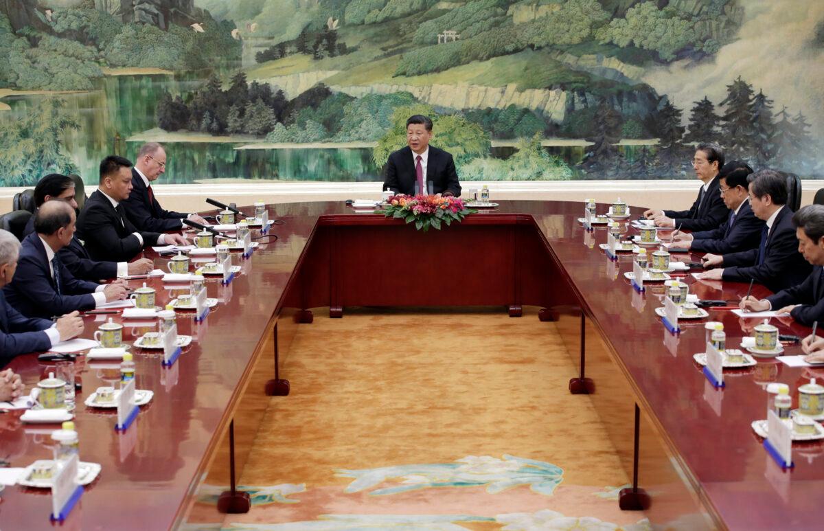  Chinese leader Xi Jinping (C) speaks during a meeting with delegates of the Shanghai Cooperation Organization (SCO) security secretary summit at the Great Hall of the People in Beijing, China, on May 22, 2018. (Jason Lee/Pool/Getty Images)