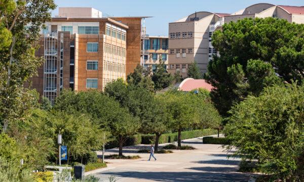 A student crosses the University of California–Irvine campus in Irvine, Calif., on Sept. 25, 2020. (John Fredricks/The Epoch Times)